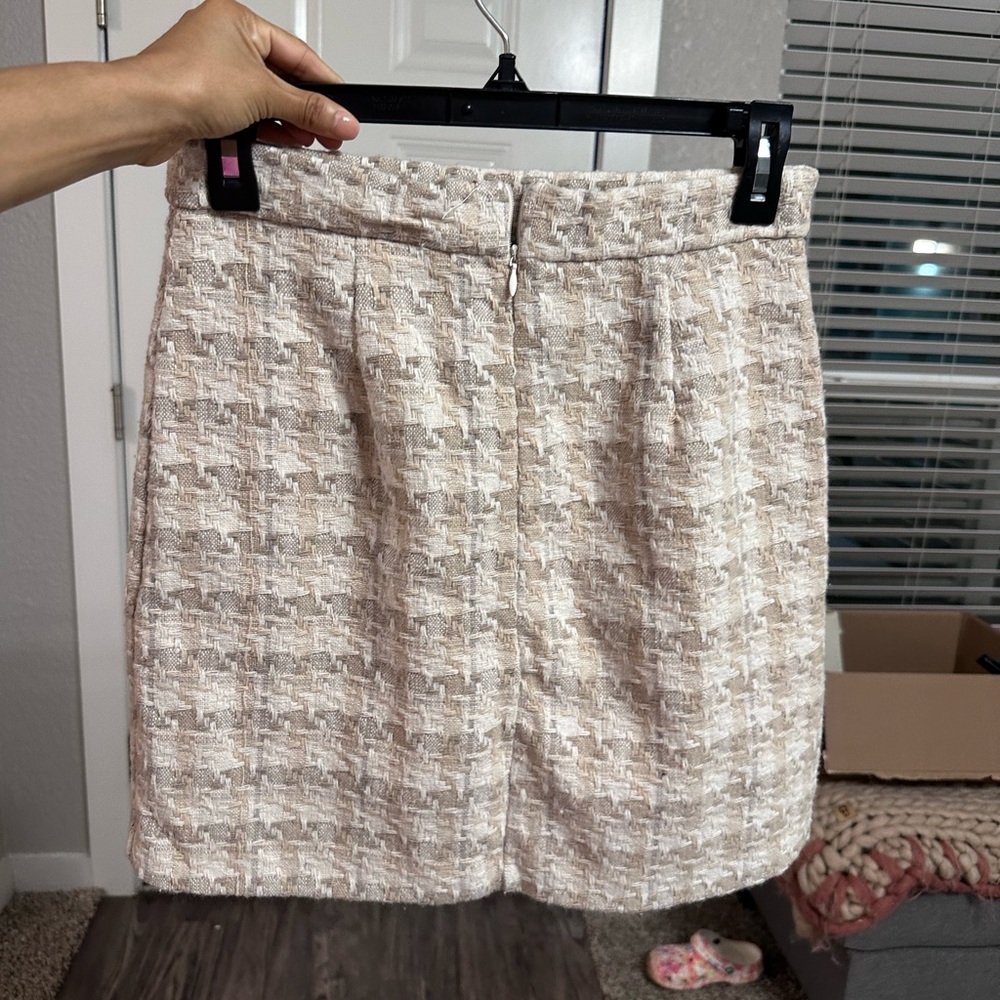 Tweed mini skirt with back zipper. Super cute for the holidays.